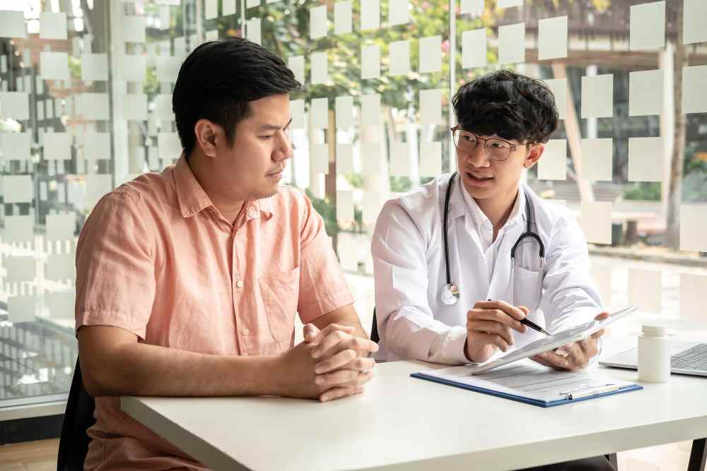 A doctor talking to a patient