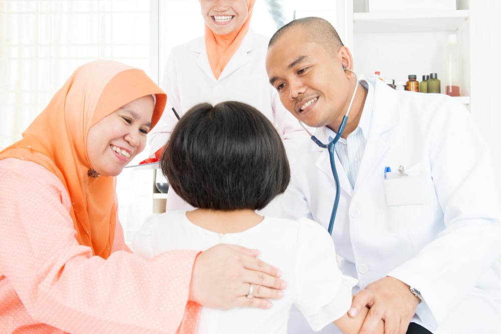 Doctors and patient